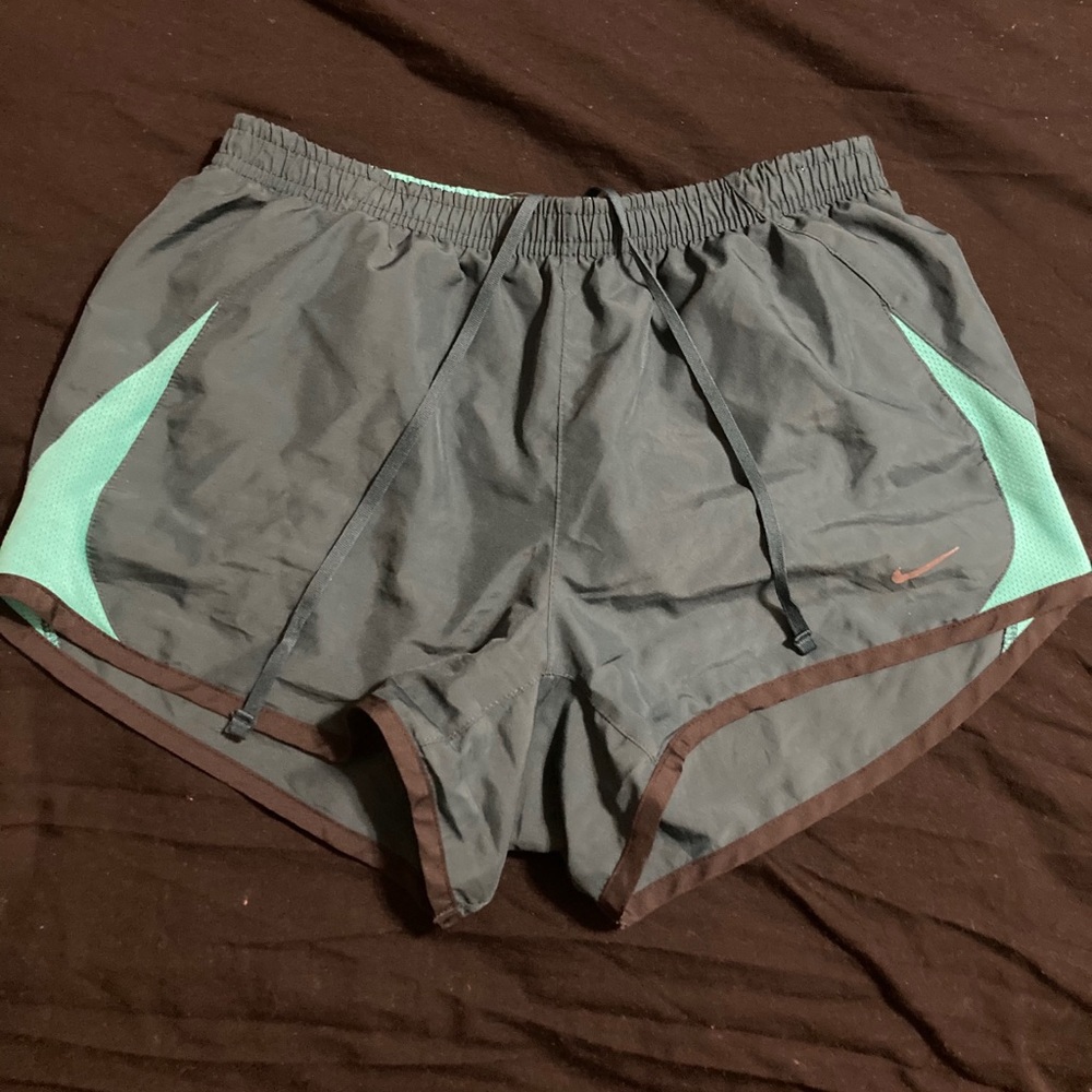Green Nike running shorts